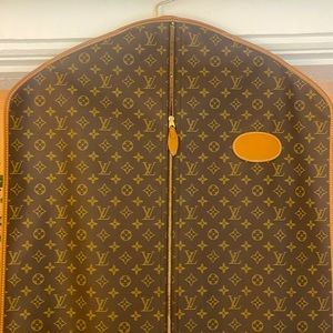 Mint condition vintage Louis Vuitton garment bag. 23" W / 58" L travel in style!